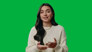 Sample clip of a woman talking to camera in front of a green screen