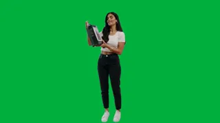 Sample clip of a woman standing with a box in her hands in front of a green screen